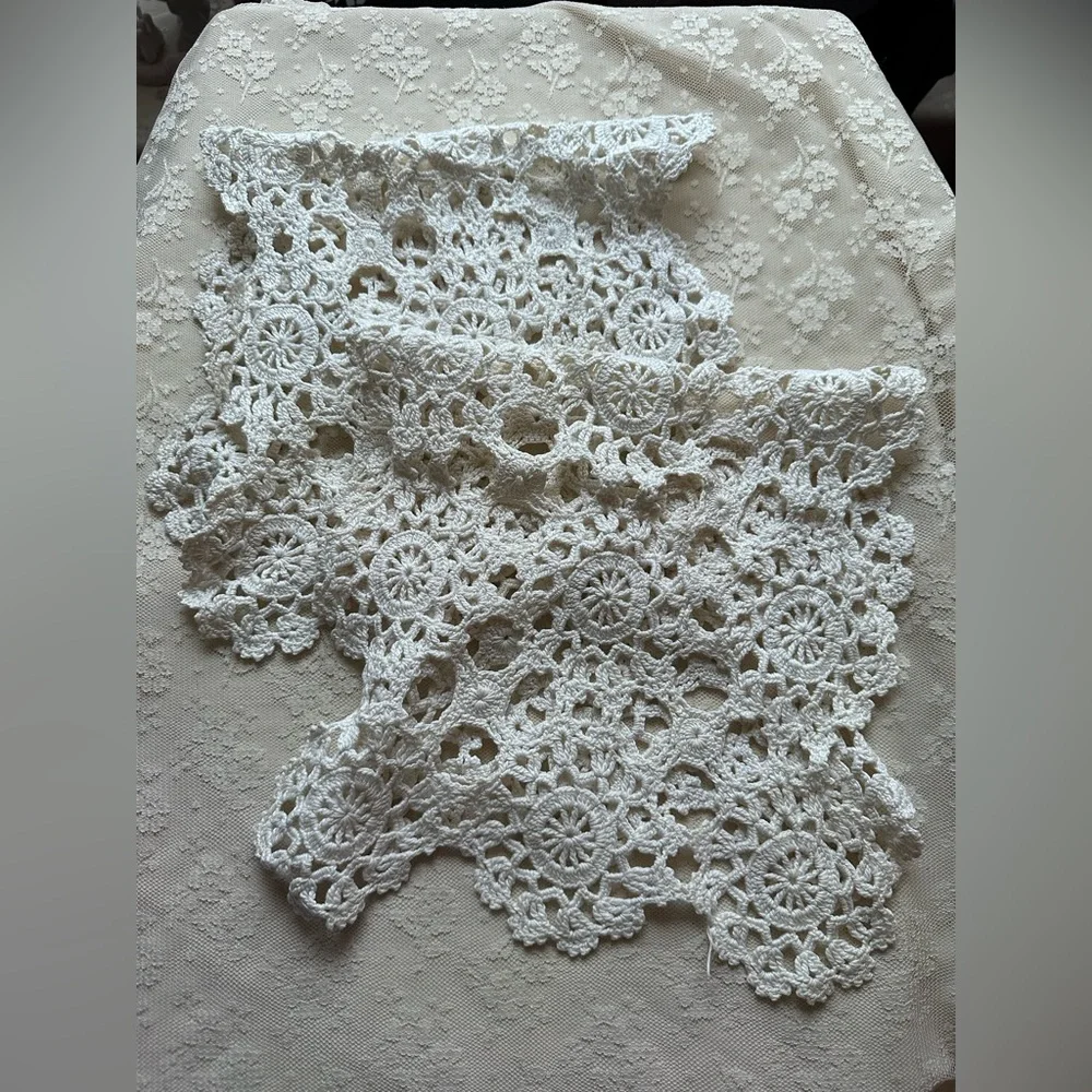 Lot of two table doilies 10 x 18 each